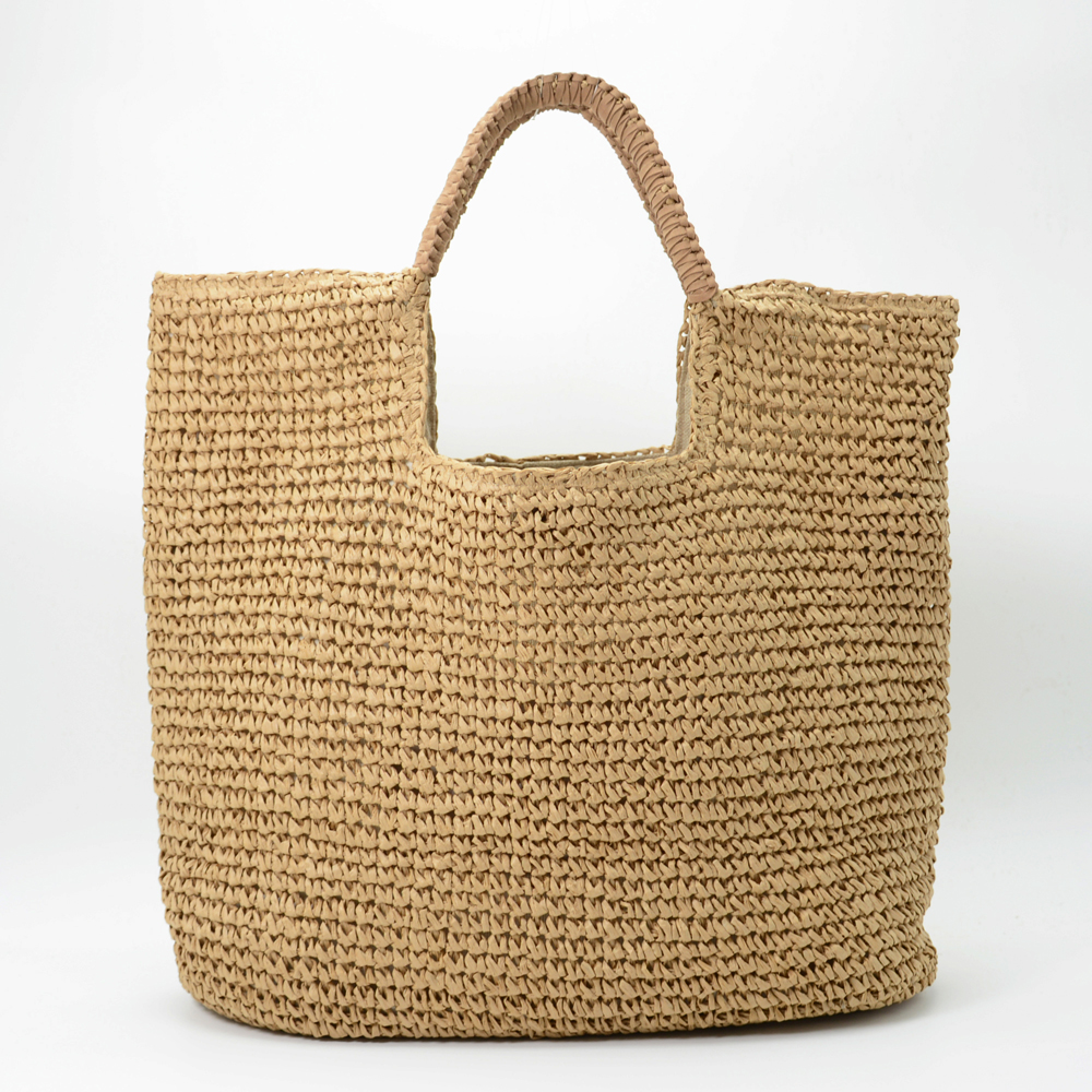 Tote style straw handbag with leather trimming 